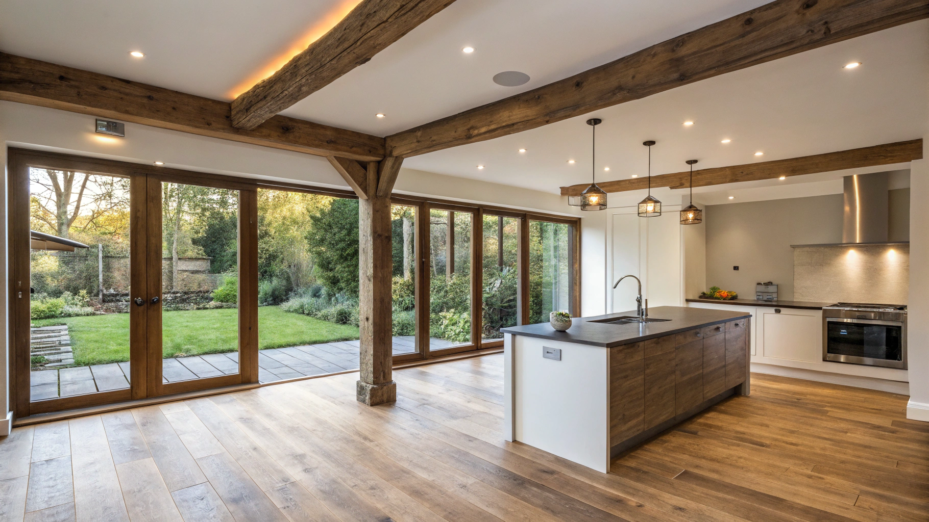 Whole-home interior transformation with open-concept floor plan, wide plank white oak floors, and recessed lighting